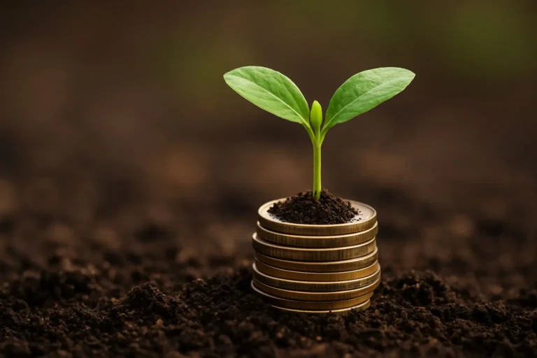 A young green plant seedling sprouting from coins in soil, symbolizing mutual fund investment and long-term wealth growth.